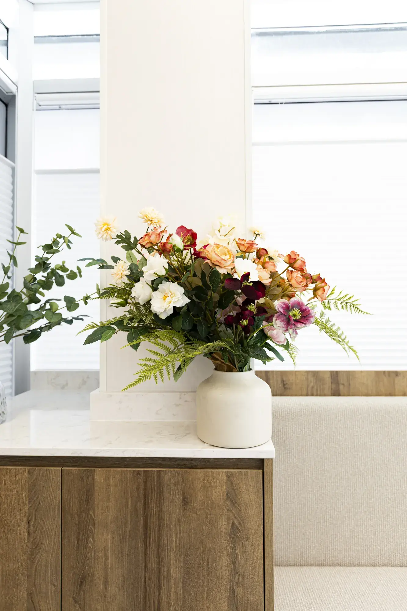 Flowers on the reception credenza