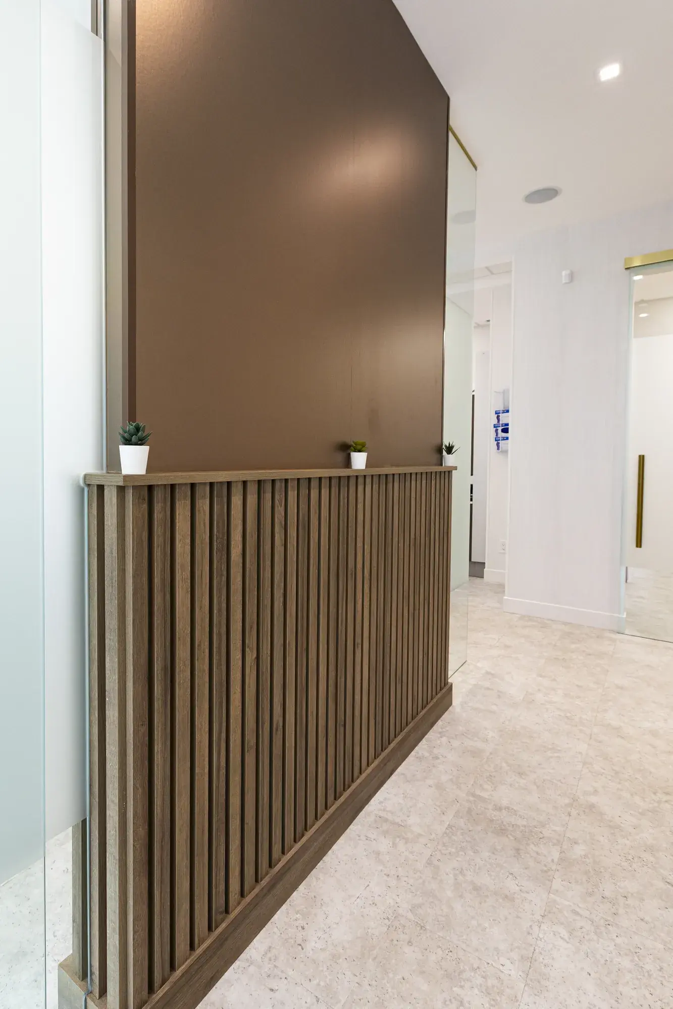 Interior hallway with a wood half-wall